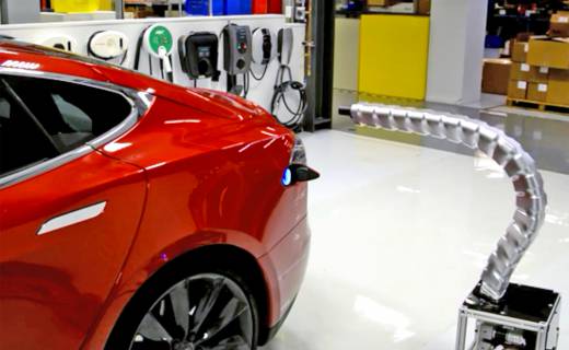 tesla robotic snake charging arm electric vehicles